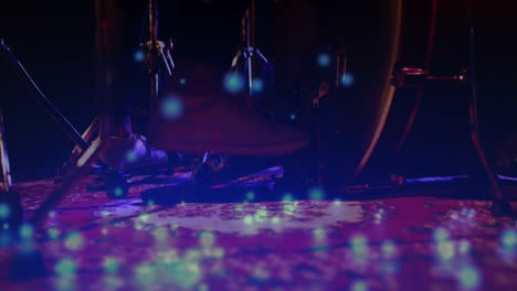 drummer foot pressing bass pedal on stage in music industry, with beat chart and note icons