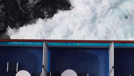 big waves hitting the side of a cruise ship