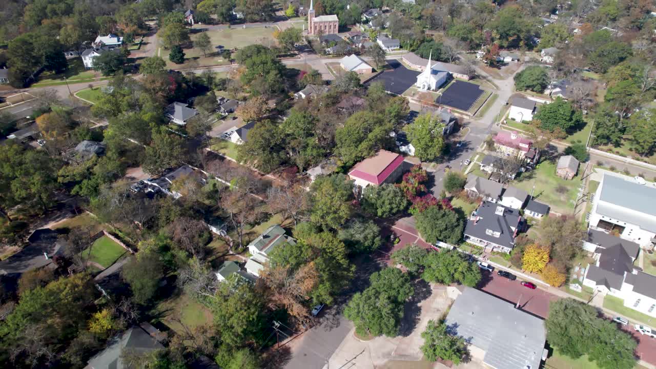 Aerial video of the city of Jefferson, Texas. Camera is flying near the Lion's Club Park