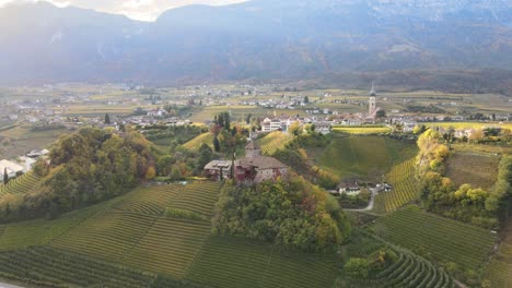 Aerial-Drone-Video-of-a-medieval-castle-in-the-middle-of-the-Vineyards-in-the-italian-alps