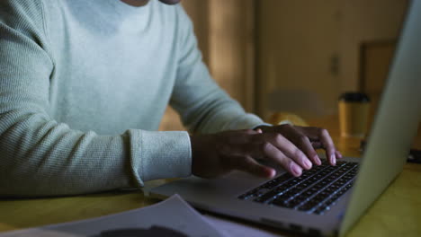 closeup on hands of an entrepreneur typing