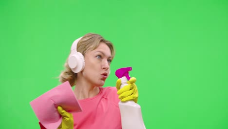 woman cleaning with headphones
