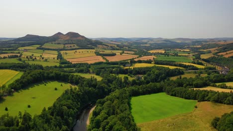 aerial view of scottish borders over the river tweed looking towards eildon hills and melrose, views of scotland