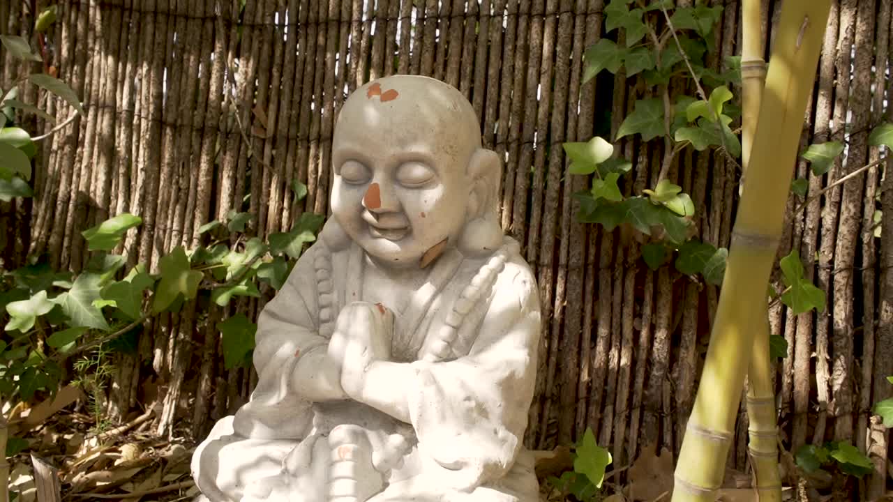 White Buddha statue in nature