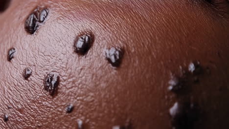 close-up of molten dark chocolate on a textured surface