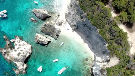 drone footage shows the clear blue adriatic sea and the sandy beaches of the italian island of tremiti