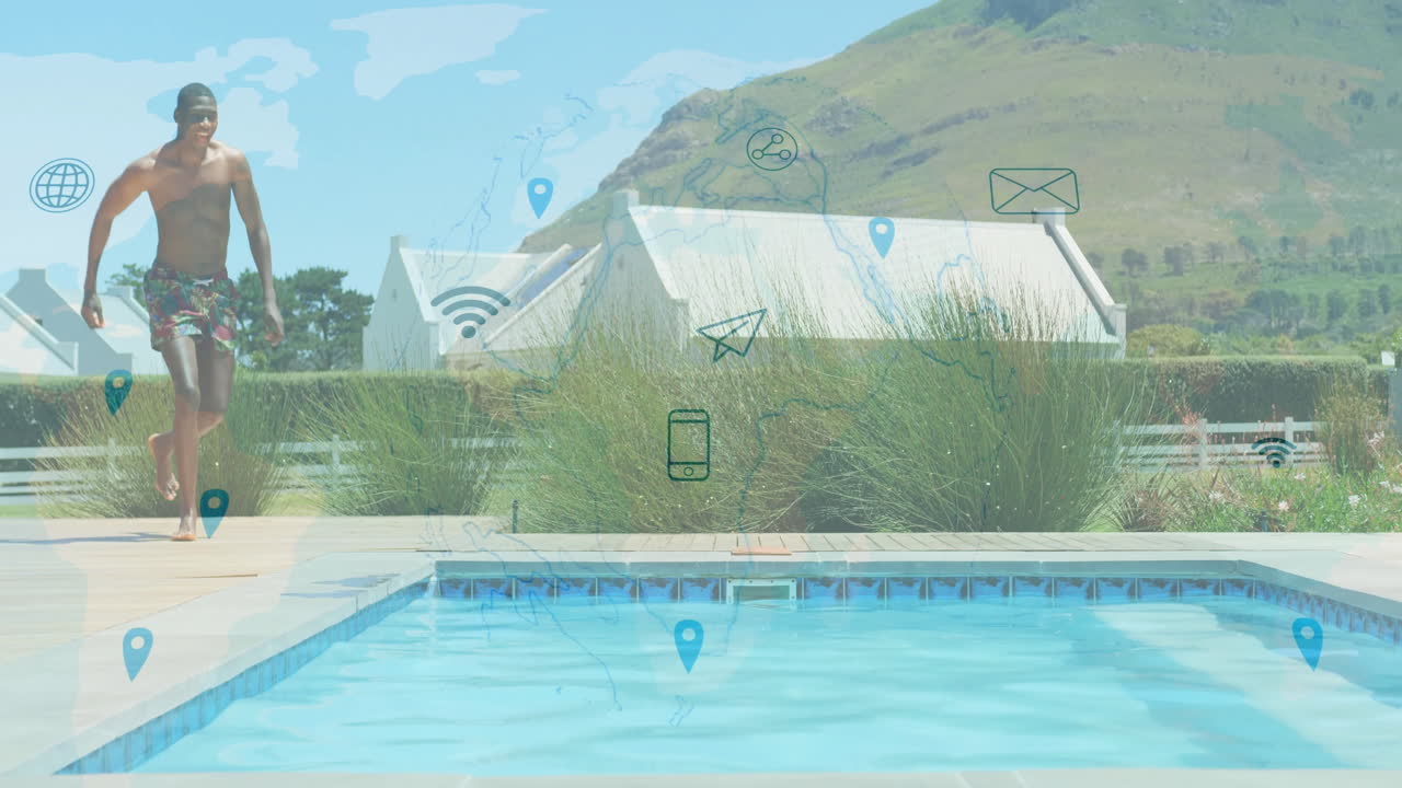 Walking by pool, man surrounded by digital network animation overlaying landscape