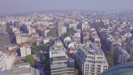 breathtaking aerial shot of saint sava temple dome and cross in belgrade