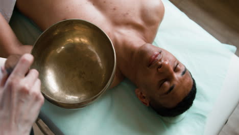 man relaxing on a stretcher