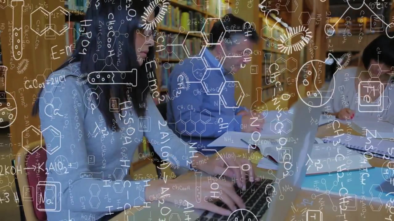 Upon starting students studying in library for chemistry course with formulas drifting across table