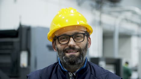 closeup view of smiling professional engineer looking at camera