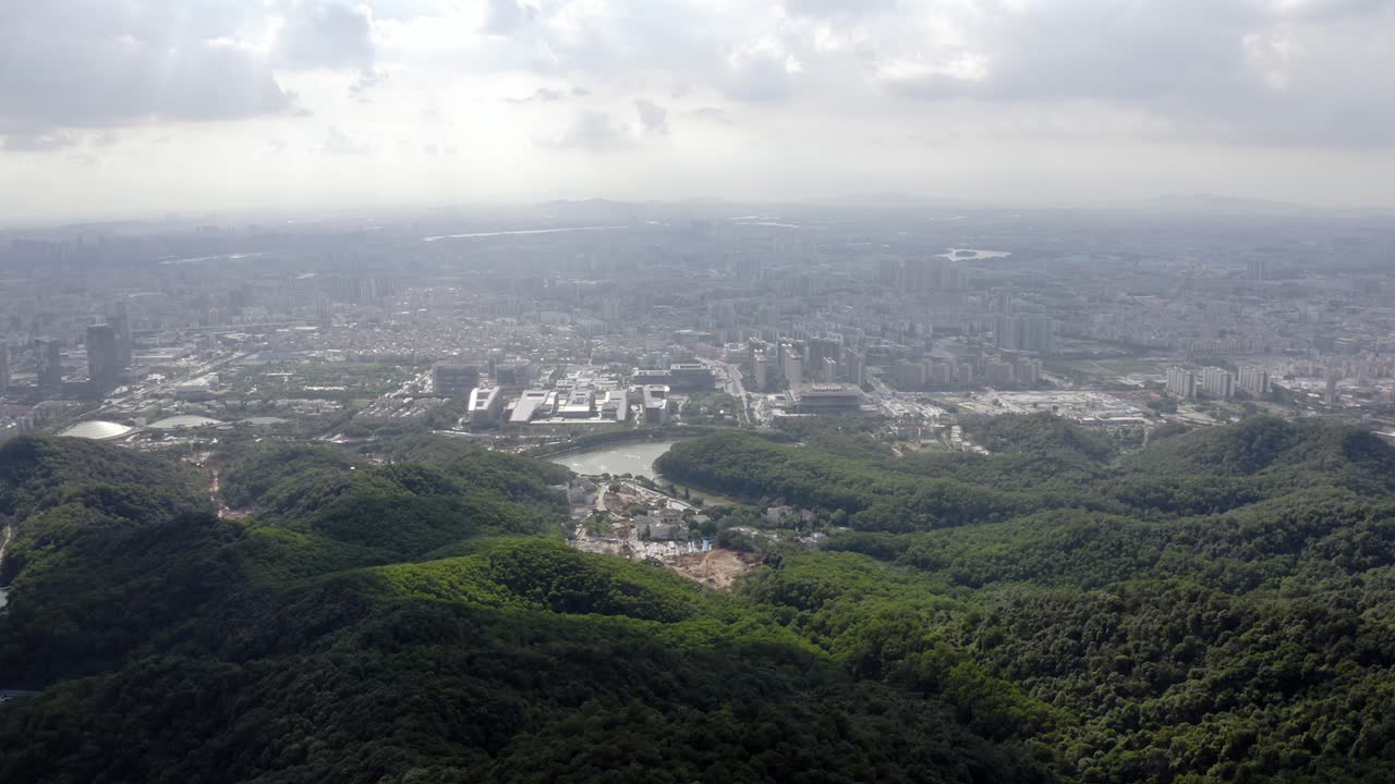 Guangzhou city and Pearl River in China, aerial view from Baiyun Mountain