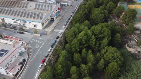 aerial view of industrial area with factory and surrounding infrastructure