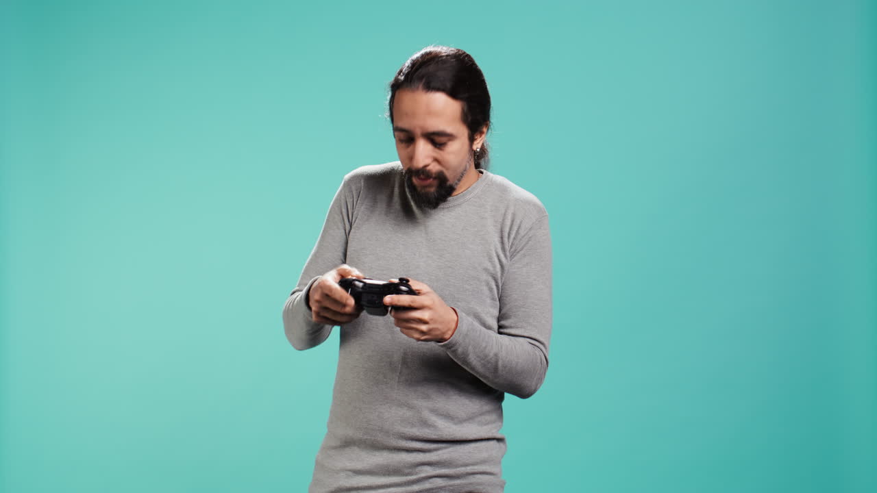 Premium stock video - Portrait of upbeat person playing intense gaming ...