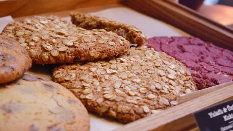 closeup of delicious cookies in a wooden tray