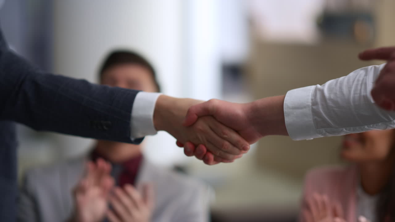 Business partners shaking hands