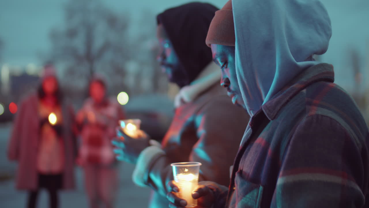 African American Men Gathering for Candlelight Vigil