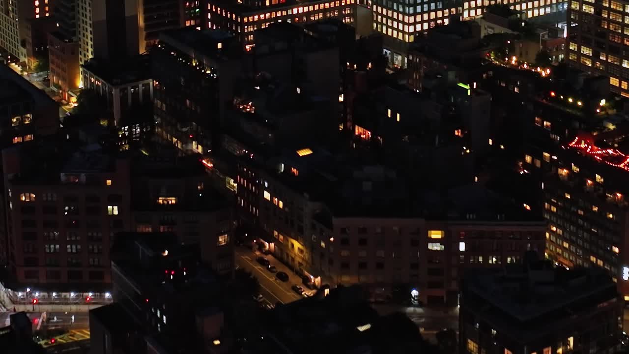 Overlooking illuminated streets of New York at night from above