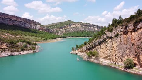 congost de mont rebei canyon at ager, catalonia and aragon, spain - aerial drone view of the blue emerald noguera ribagorzana river