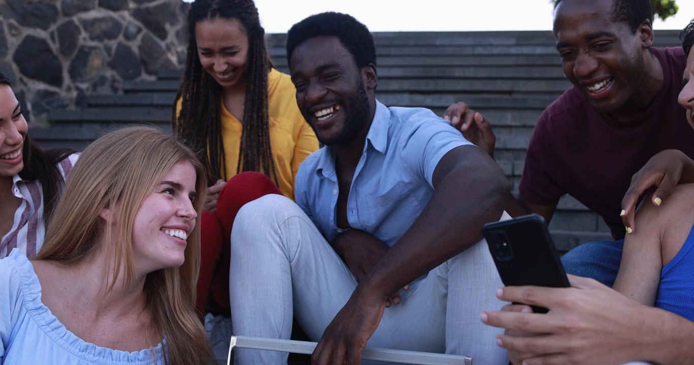 Happy Multi-Ethnic Friends Laughing Together Outdoors