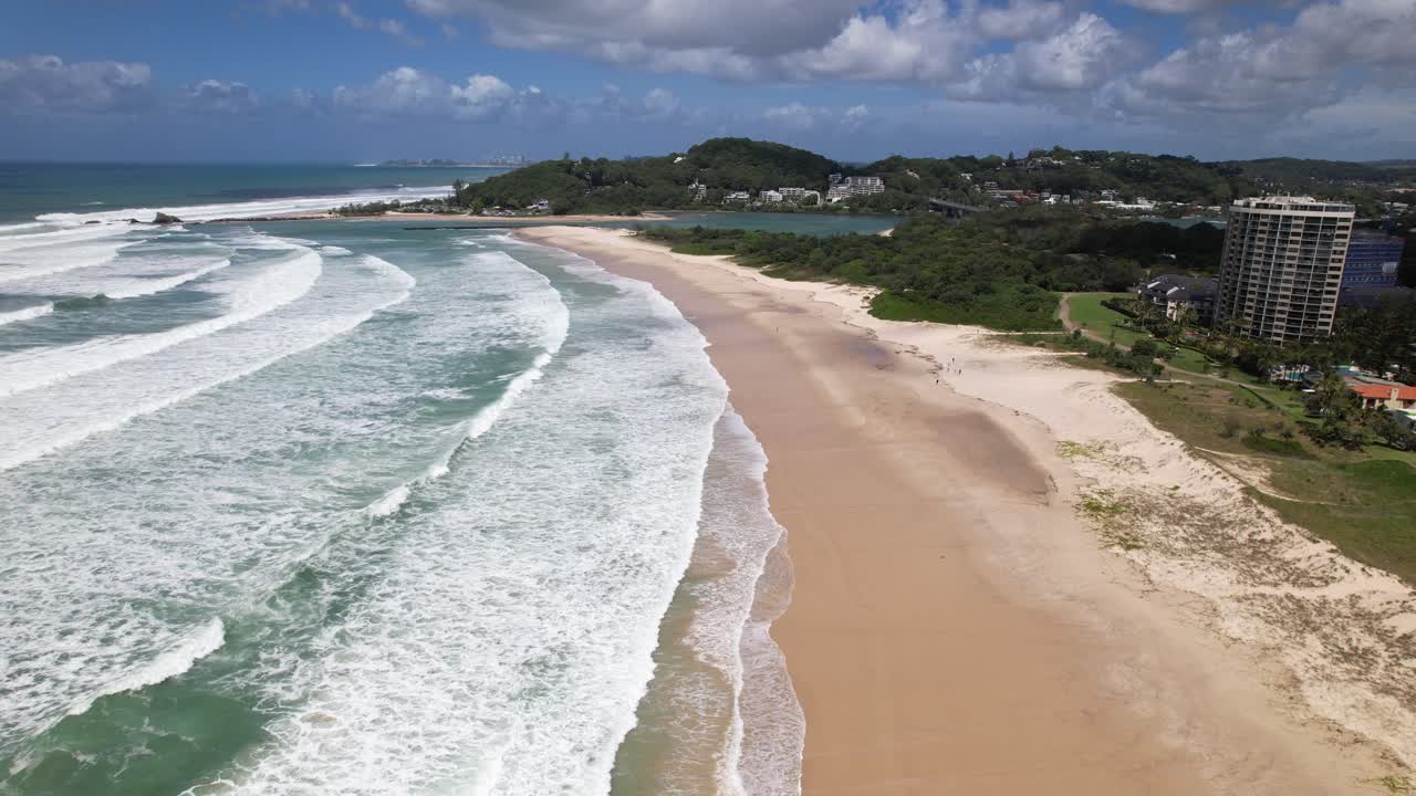Foamy Waves In The Shoreline Of Palm Beach With Currumbin Alley, Rock And Beach In The Distance - QLD, Australia. - aerial shot