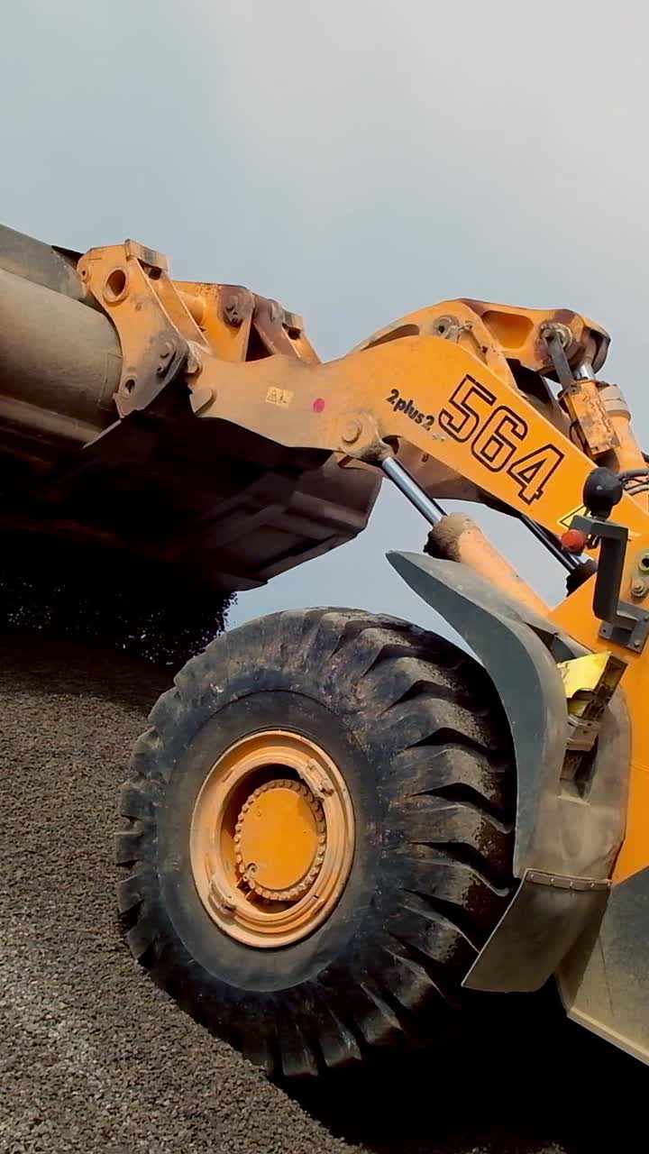 Heavy excavator on quarry. Heavy duty machinery working on quarry