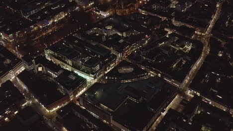 AERIAL:-Slow-Shot-of-City-at-Night,-Cologne,-Germany