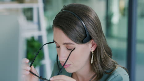 a young woman looking stressed out while using