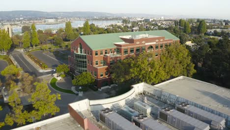 another pass across a large business center on a sunny day