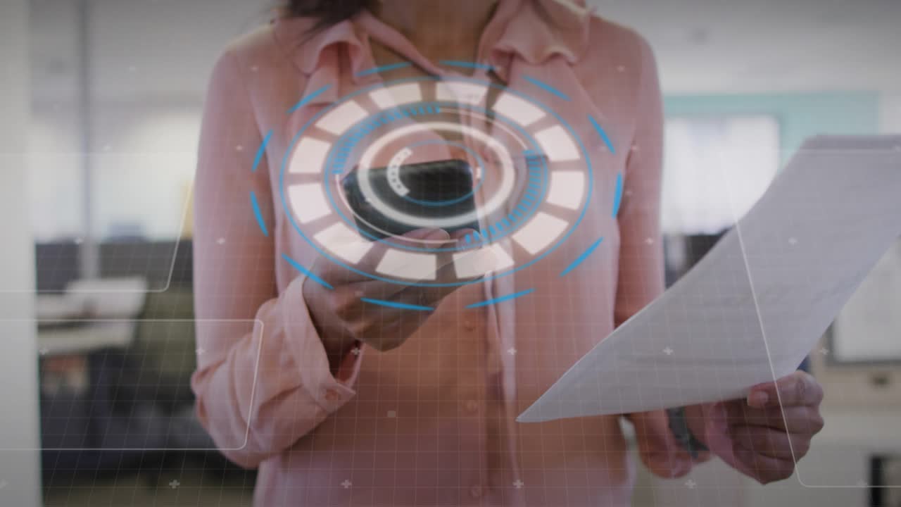 Business woman raising smartphone and scanning paper, activating pulsing HUD circuitry showing data