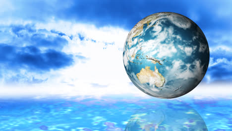 animation of a globe spinning against sky background