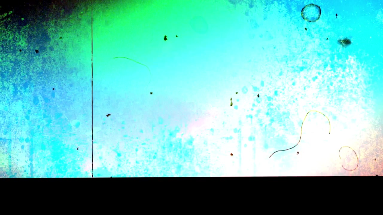 Flickering Abstract Film Grain Overlay with Colorful Scratches