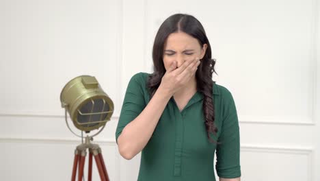 indian woman disturbed by bad smell
