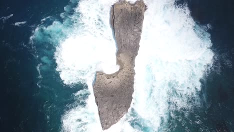 aerial shot of a lonely, rocky island found off the coast of oahu, hawaii