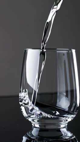 water pouring into a glass