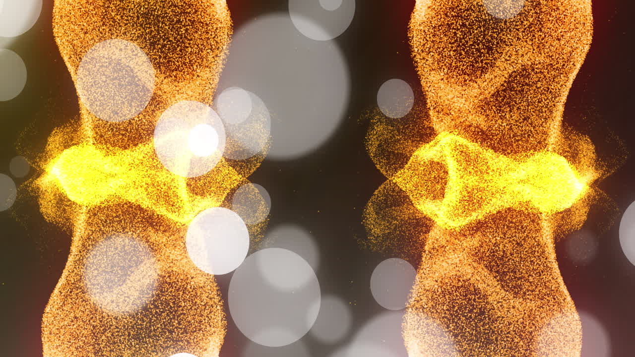 검은 바탕에 오렌지색 입자의 파도 위에  ⁇ 색 빛 반점이 있습니다.