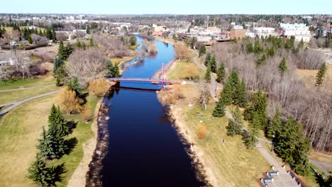 This-clip-is-a-drone-flying-upwards-in-front-of-a-river