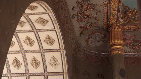 detailed carvings in the archway of the patuxai victory monument in the center of vientiane, laos