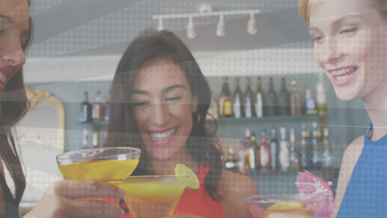 Third woman joining, three women aligning cocktails at bar, camera panning closer, toasting friends