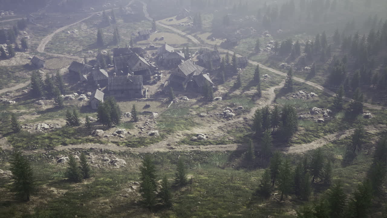 Rustic village nestled in a misty forest landscape during early morning light