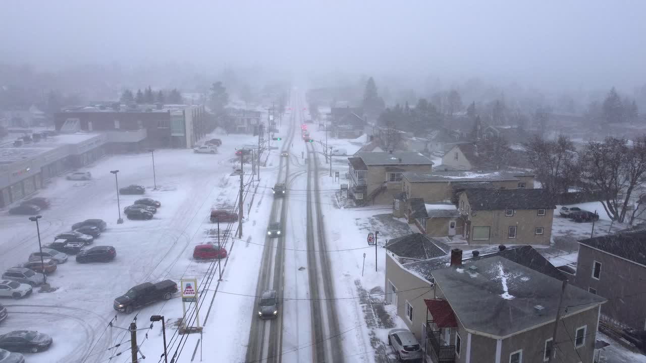 A snowy day on the main avenue in Orford, Québec, Canada