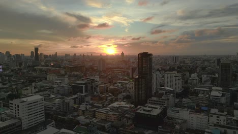 perfect orange sunset over city metropolis of asia