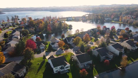 gimbal tracking over homes in late autumn with stunning colors