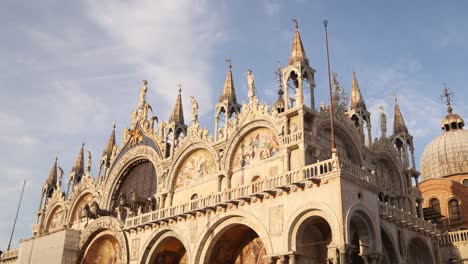 st. mark's basilica glows under the golden evening sun in venice italy capturing stunning architecture