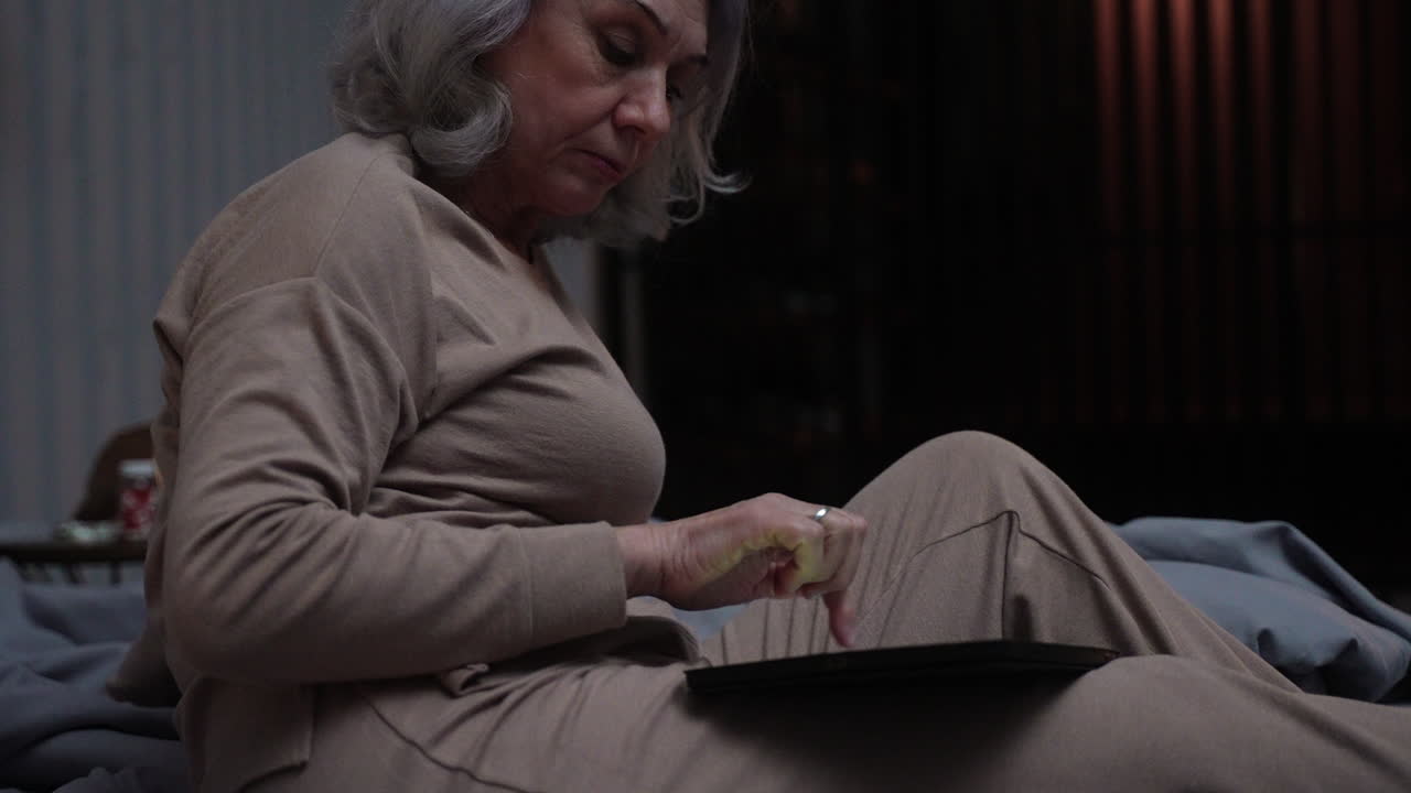 Woman in bed at home