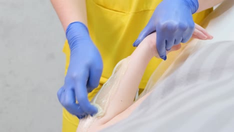 woman waxing arm in sportswear outfit with blue gl 4k 2025 07 22 03 43 36 utc.mov | accessory, aesthetics, arm, beautification