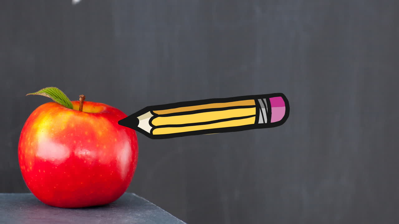 animación de los iconos de los artículos escolares sobre la manzana y el pizarrón