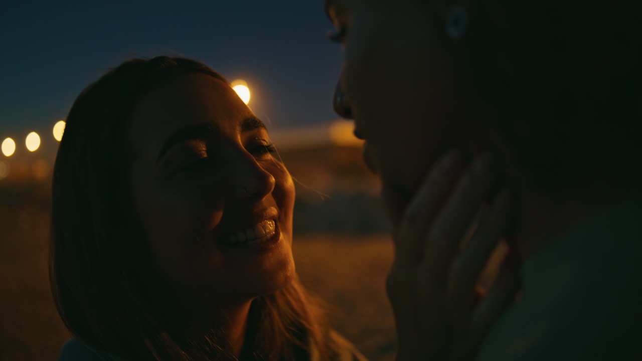 Happy woman face looking boyfriend night nature closeup. Man silhouette talking