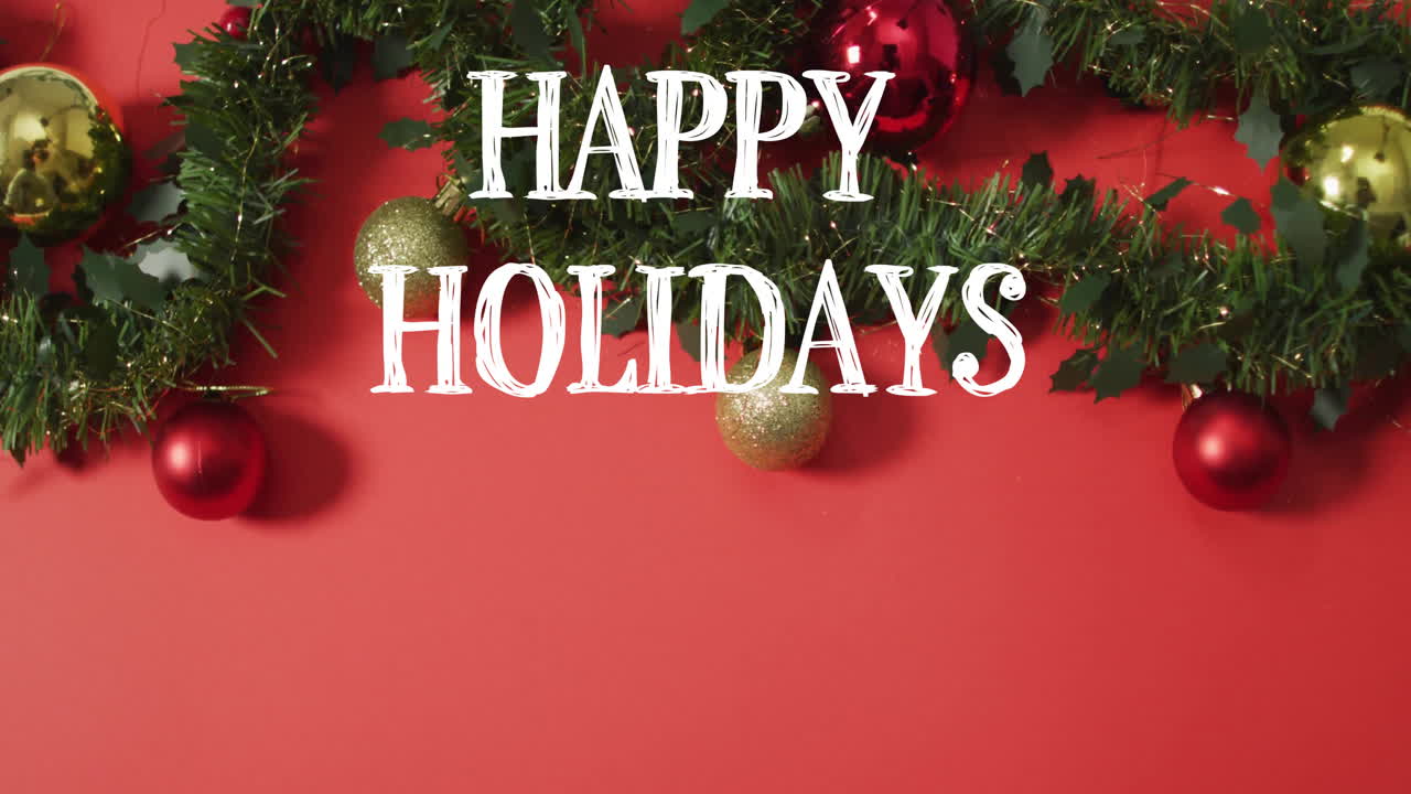 Happy Holidays text animation over Christmas decorations on red background