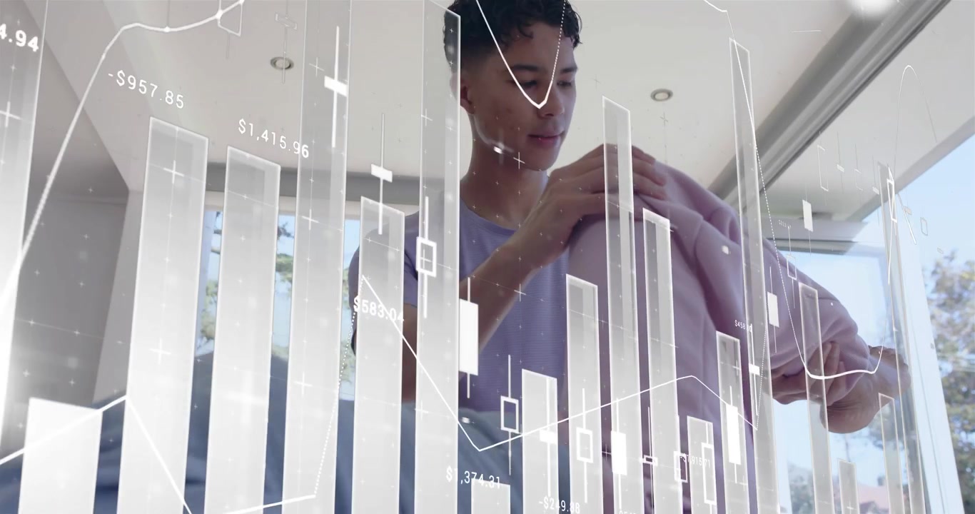 Man lifting pink sweater, inspecting and folding it upon data overlay appearing in retail scene